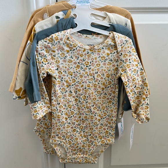 Carter’s nine months, onesies brand new - Picture 1 of 3